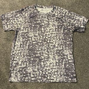 Under armor mens size: medium silver colored t shirt